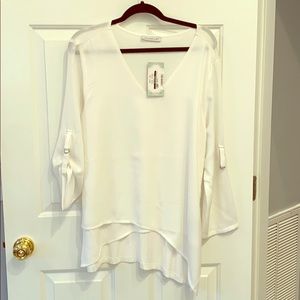 White V neck, asymmetrical front blouse